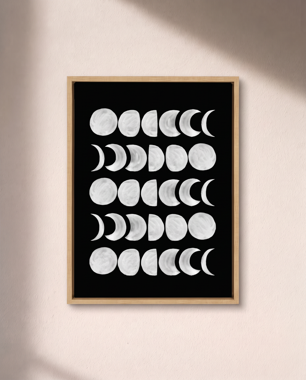 Moon Phases — White on Black Framed Canvas