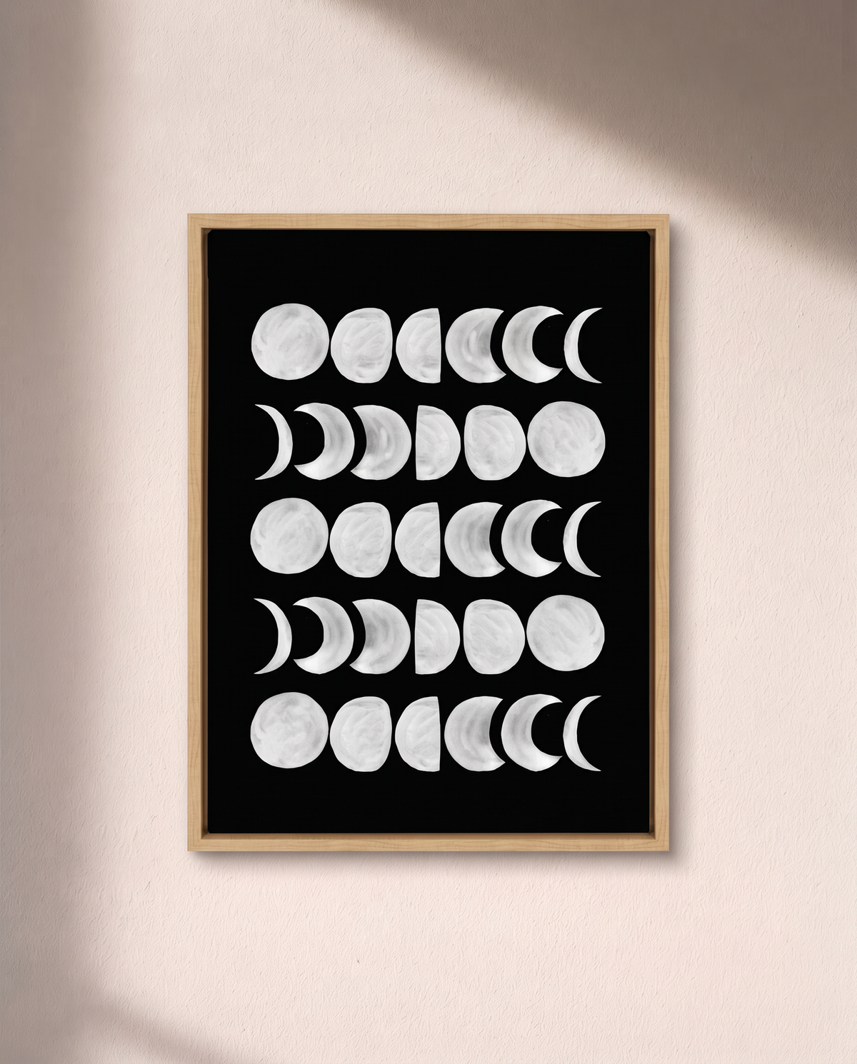 Moon Phases — White on Black Framed Canvas
