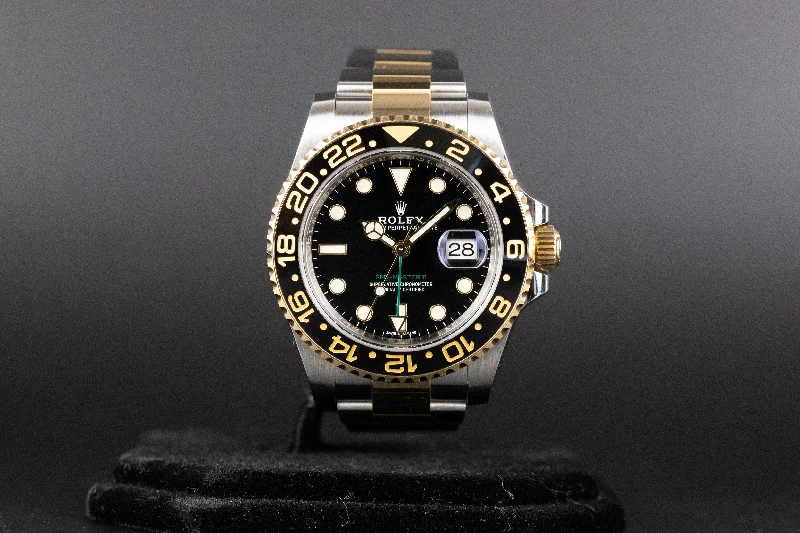 Casual watches for weekend outings   Rolex<br>116713LN GMT Master II SS/18k Black Dial
